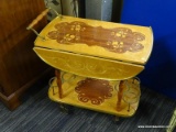 (R3) TEA CART; DROP LEAF TEA CART WITH A 2 TONED TOP SHELF FLORAL DESIGN ON THE TOP AND BOTTOM