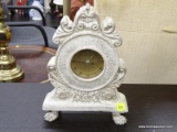 (R3) QUARTZ CLOCK; FOOTED MANTLE STYLE CLOCK WITH QUARTZ INNER WORKINGS. IS IN EXCELLENT CONDITION