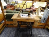 (R3) ANTIQUE SINGER SEWING MACHINE; HAS A CAST IRON BASE AND 4 DRAWERS (2 ON EITHER SIDE) AS WELL AS