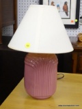 (R3) PINK TABLE LAMP; HAS A BELL SHAPED SHADE AND MEASURES 15 IN TALL