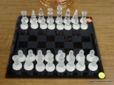 (R4) CHESS SET; GLASS CHESS SET WITH FROSTED GLASS AND CLEAR GLASS PLAYING PIECES AND A BLACK GLASS