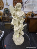 (R4) FAIRY STATUE; GARDEN STATUE OF A FAIRY HARVESTING FLOWERS. IS IN USED CONDITION AND MEASURES 28