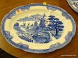 (R4) BLUE AND WHITE SERVING PLATTER; DEPICTS A DUTCH VILLAGE SCENE WITH BOATS IN THE BACKGROUND. IS
