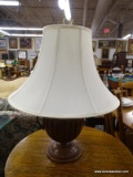 (R4) WOODEN TABLE LAMP; SOLID WOODEN URN SHAPED LAMP WITH SHADE AND BRASS FINIAL. IS IN EXCELLENT