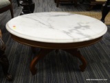 (R4) VICTORIAN COFFEE TABLE TABLE; HAS A WHITE MARBLE TOP WITH WALNUT BASE. IS IN EXCELLENT