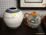 (BACK WALL) 2 PIECE LOT; INCLUDES AN ART POTTERY VASE SIGNED STAN, AND A TEA CUP/TEA POT COMBO WITH