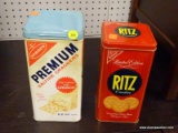 (BACK WALL) PAIR OF NABISCO CRACKER TINS; 1 IS FOR SALTINES AND 1 IS FOR RITZ CRACKERS. BOTH ARE IN
