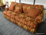 (WALL) 2 CUSHION SOFA; RED UPHOLSTERED 2 CUSHION SOFA WITH GOLD FLORAL PATTERN. IS IN VERY GOOD