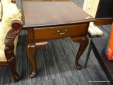 (WALL) BROYHILL END TABLE; WOODEN, SINGLE DRAWER END TABLE WITH QUEEN ANNE LEGS. MEASURES 22.25 IN X