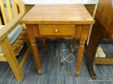(WALL) END TABLE; SINGLE DRAWER END TABLE WITH TAPERED LEGS AND BULB FEET. MEASURES 21 IN X 18.75 IN