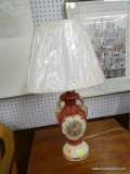 (WALL) TABLE LAMP; VASE SHAPED, HAND PAINTED TABLE LAMP WITH A RED/PINK, CREAM, AND GOLD TONE COLOR.