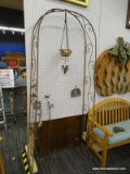 (WALL) WROUGHT IRON TRELLIS; FOLDING ARCHED WROUGHT IRON TRELLIS WITH SCROLLING DETAIL. RUSTING