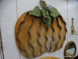 (WALL) WALL HANGING PUMPKIN; LARGE, METAL WALL HANGING PUMPKIN. NEEDS TO BE CLEANED. MEASURES 4 FT X