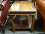 (R2) END TABLE; WOODEN END TABLE WITH A MULTI TONED TABLE TOP AND A LOWER SHELF. SITS ON 4 REEDED