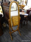 (R2) TILTING MIRROR; WOODEN OVAL MIRROR ON A STAND THAT CAN TILT AND ADJUST TO YOUR LIKING. MEASURES