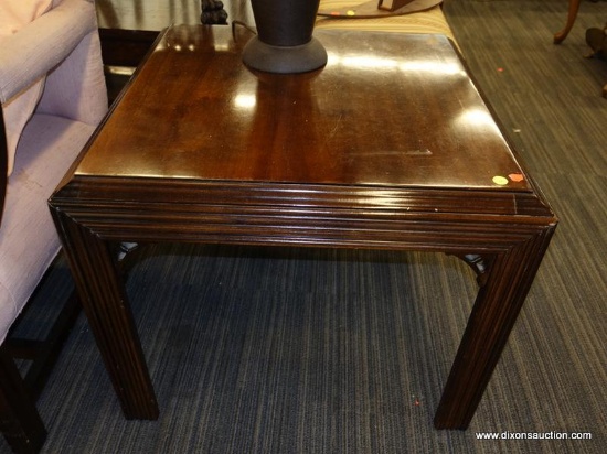 (R1) END TABLE; WOODEN END TABLE WITH A TERRACED EDGE AND REEDED DETAILING ALONG THE BLOCK LEGS.