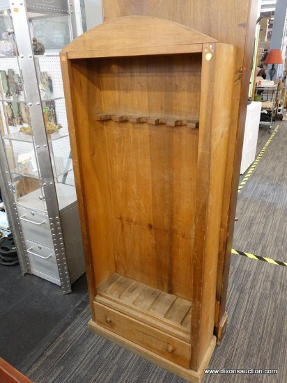 (R1) GUN CABINET; WOODEN GUN CABINET WITH 6 GUN SLOTS AND A BOTTOM PEG CONSTRUCTED DRAWER. MEASURES