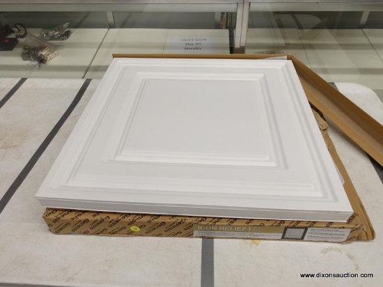 (R2) LAY-IN CEILING PANEL; GENESIS PVC CEILING TILE, ICON RELIEF IN WHITE. MEASURES 2 FT X 2 FT.