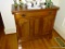 (LR) SERVER; CHERRY SERVER WITH 1 DRAWER DOVETAILED WITH OAK SECONDARY OVER 2 LOWER PANELED DOORS-