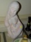 (LR) SCULPTURE; CERAMIC SCULPTURE OF A COUPLE IN PASTEL COLORS- 9 IN X 18 IN