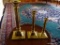 (LR) BRASS CANDLEHOLDERS; 3 UNMARKED GRADUATED CANDLE HOLDERS- TALLEST 9 IN AND SMALLEST- 5.5 IN H