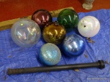 (GARAGE) GAZING BALLS; 7 LARGE GLASS YARD GAZING BALLS AND 1 POLE