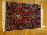 (HALL) HAND MADE RUG; PERSIAN HANDMADE RUG IN RED, BLUE AND IVORY- 25 IN X 32 IN