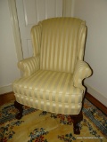 (UPHALL) WING CHAIR; FAIRFIELD MAHOGANY BALL AND CLAW WING CHAIR WITH CARVED KNEES- UPHOLSTERY IN