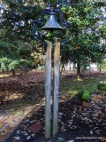 (BACKYD) FARM BELL; CAST IRON FARM BELL- 24 IN X 29 IN (NEED TO BRING TOOLS TO REMOVE FROM POSTS)