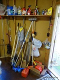 (SHED) WALL AND SHELF LOT; LOT CONSISTS OF YARD TOOLS, BROOMS GAS CANS, ALL THE CAR SUPPLIES ON