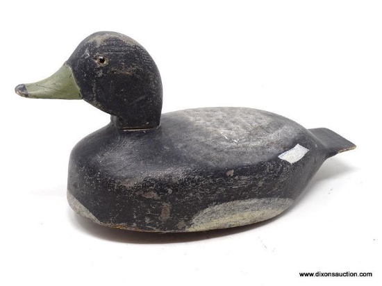 VINTAGE SOLID BODY FLAT BOTTOM SCALP DECOY. RAISED NECK SEAT. HANGING WEIGHT. SCREW ATTACHED HEAD.