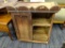 (R2) POPLAR CUPBOARD; VINTAGE WOODEN CUPBOARD WITH SCALLOPED CROWN WITH A FLARED RETURN, HAS AN OLD