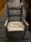 (R3) CHILDS ROCKER; MULE EAR COUNTRY ROCKER WITH A WOVEN SEAT, A BOX STRETCHER, A BLUE PAINT FINISH.