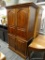 (R4) ENTERTAINMENT ARMOIRE; WOODEN, FLARED CORNICE ENTERTAINMENT ARMOIRE WITH BRASS HARDWARE. TOP