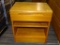 (R4) NIGHT STAND; WOODEN NIGHTSTAND WITH A TOP DRAWER WITH AN INDENTED HANDLE AND 2 LOWER SHELVES.