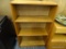 (R4) BOOK CASE; WOODEN 2 ADJUSTABLE SHELF BOOKCASE. MEASURES 30.25 IN X 11.25 IN X 4 FT.