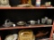 (BAY 6) SHELF LOT OF PEWTER AND SILVERPLATE; LOT CONTAINS A RODNEY KENT HAMMERED PEWTER FLORAL