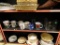 (BAY 6) SHELF LOT OF MUGS AND GLASSES; INCLUDES MULTIPLE RELIGIOUS COFFEE MUGS AND CHRISTMAS MUGS, A