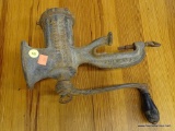 (R2) VINTAGE MEAT GRINDER; COUNTER MOUNT, METAL MEAT GRINDER WITH SIGNS OF RUSTING AND A BLACK