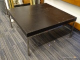 (BACKWALL) COFFEE TABLE; 1 OF A PAIR OF CONTEMPORARY COFFEE TABLES WITH STAINLESS STEEL LEGS AND