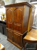 (R4) ENTERTAINMENT ARMOIRE; WOODEN, FLARED CORNICE ENTERTAINMENT ARMOIRE WITH BRASS HARDWARE. TOP