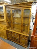 (R4) 2 PC WOODEN CHINA CABINET; TOP PIECE HAS DENTAL MOLDING AROUND THE FLARED CORNICE TOP LEADING