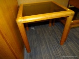 (R4) GLASS TOP END TABLE; SQUARE END TABLE WITH A TINTED GLASS TABLE TOP WITH POLE LEGS. MEASURES 2