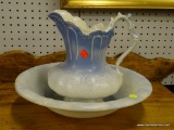 (R1) CERAMIC PITCHER AND BASIN; BLUE AND WHITE IN COLOR. IN GOOD CONDITION. BOWL HAS A 15 IN