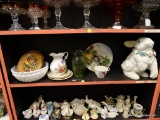 (BAY 6) SHELF LOT; 11 PIECE LOT TO INCLUDE A FOOTED TEA CUP, A DECORATIVE GARDEN BUNNY, A GREEN
