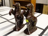 (BAY 6) HEAVY GLOSS PAINTED HORSES; PAIR OF HORSES ON THEIR HIND FEET WITH A BROWN GLOSS FINISH.