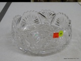 (BAY 6) LARGE GLASS BOWL; 9 IN DIAMETER CUT GLASS BOWL WITH ASTRAL DETAILING.