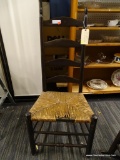 (R1) EARLY LADDER-BACK SIDE CHAIR; HAS A RUSH BOTTOM SEAT WITH MINOR DAMAGE TO THE FRONT, HAS FOUR