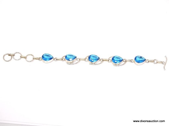 .925 TOPAZ BRACELET; NEW 7-8" GORGEOUS SWISS BLUE TOPAZ BRACELET WITH TOGGLE CLASP. SRP $ 69.00.