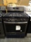 WHIRLPOOL 5.0 CU. FT. GAS RANGE WITH SELF-CLEANING OVEN AND CENTER OVAL BURNER IN STAINLESS STEEL.